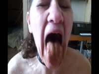 Poop  XXX Video Older woman shows shit inside her mouth.